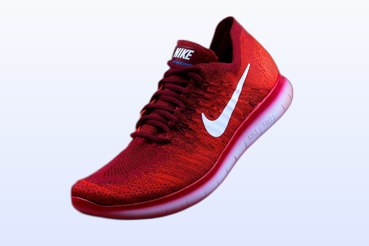 Same sneaker isolated on a soft gradient background for e-commerce